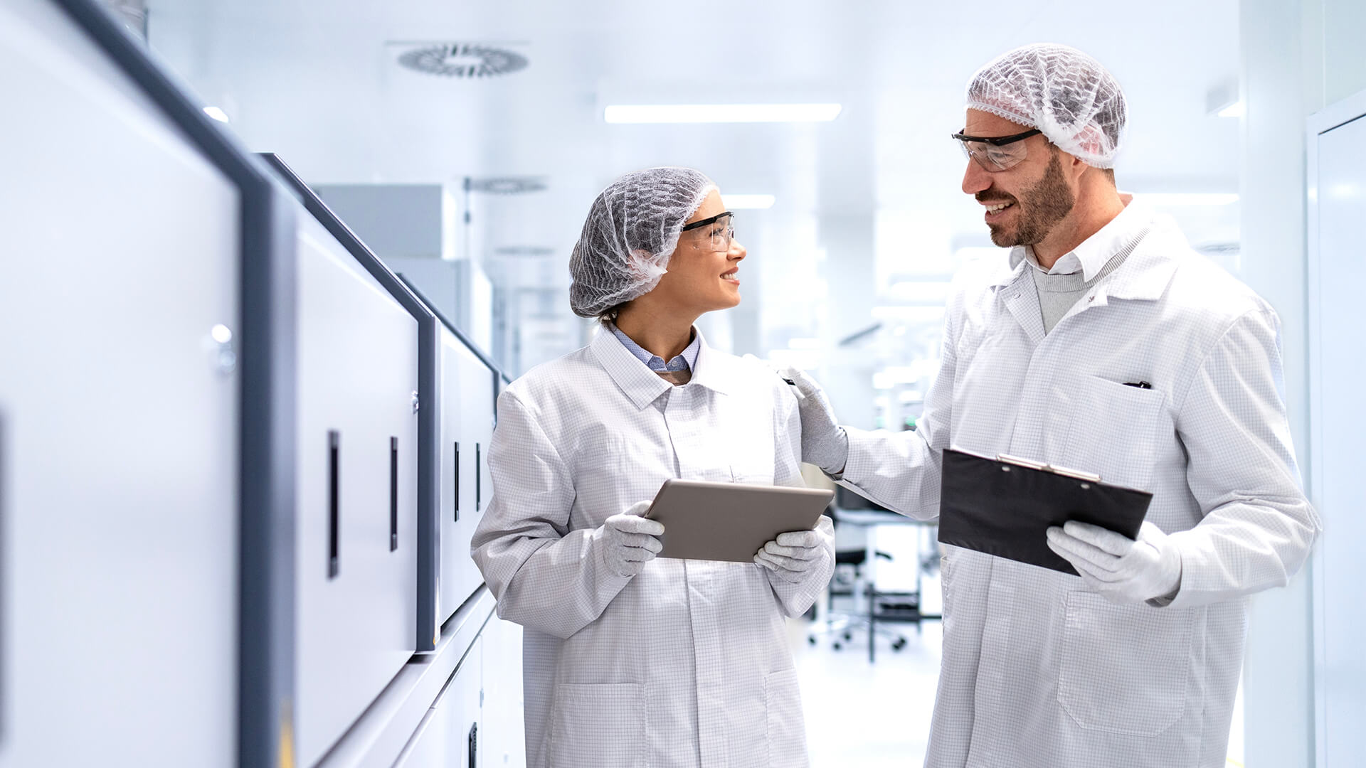 Pharmaceutical professionals discussing pharma CDMO staffing solutions.
