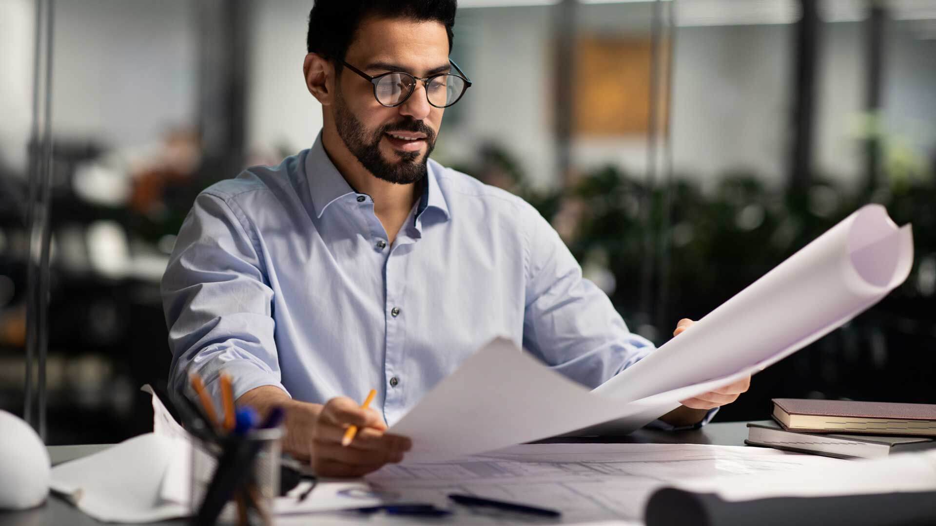 Male on technical team conducting a thorough analysis of the client’s requirements.